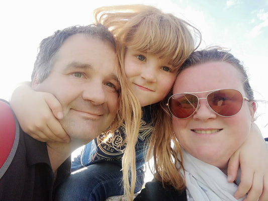 Picture of the Copper & Holly family, including husband Gwilym, wife Annabelle, and daughter Holly
