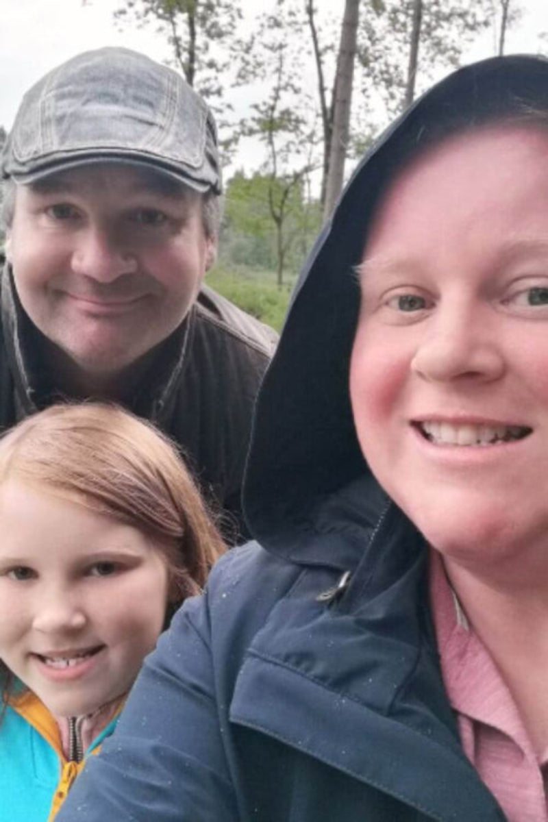 The Copper & Holly family, outside enjoying a rainy, Spring walk. Showing husband Gwilym, daughter Holly and owner Annabelle