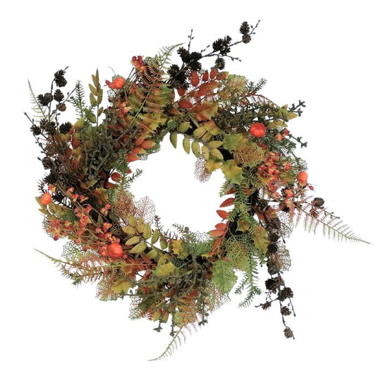 Decorative wreath with autumnal leaves and berries on a white background