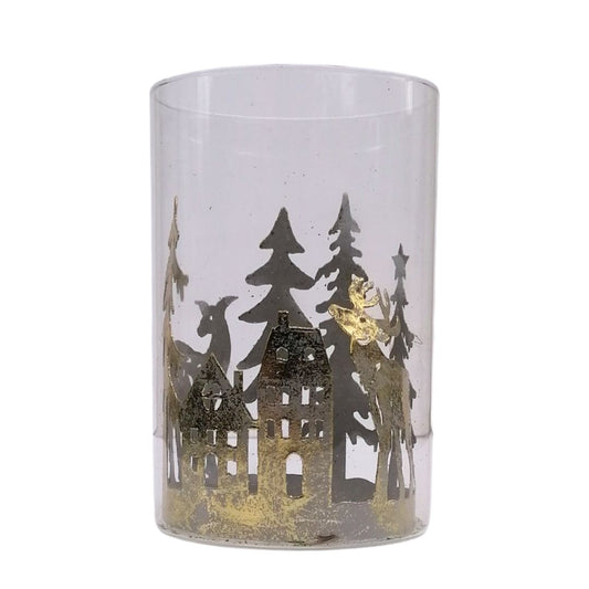 Decorative glass with cut-out silhouettes of a house, trees, and people on a white background