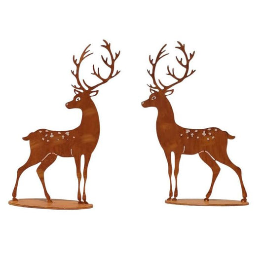 Two metal deer figurines on a white background