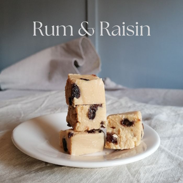 Rum & Raisin dessert on a white plate with a neutral background