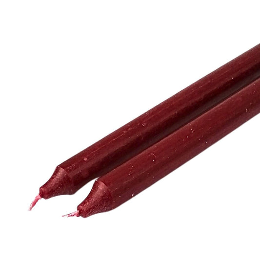 White cut out image showing the tops of the burgundy fragrance free wax dinner candles