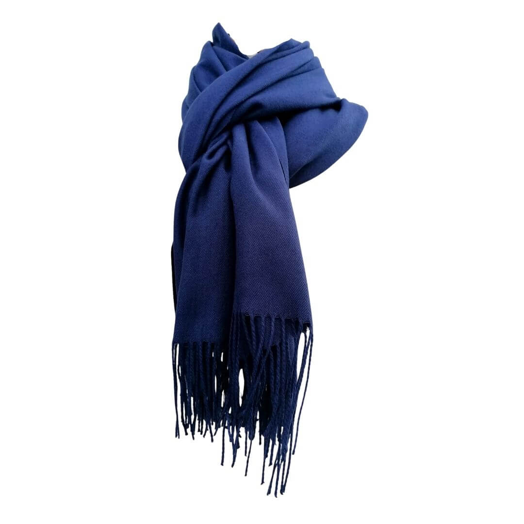 Deep blue long pashmina scarf shawl with fringe tied loosly around neck