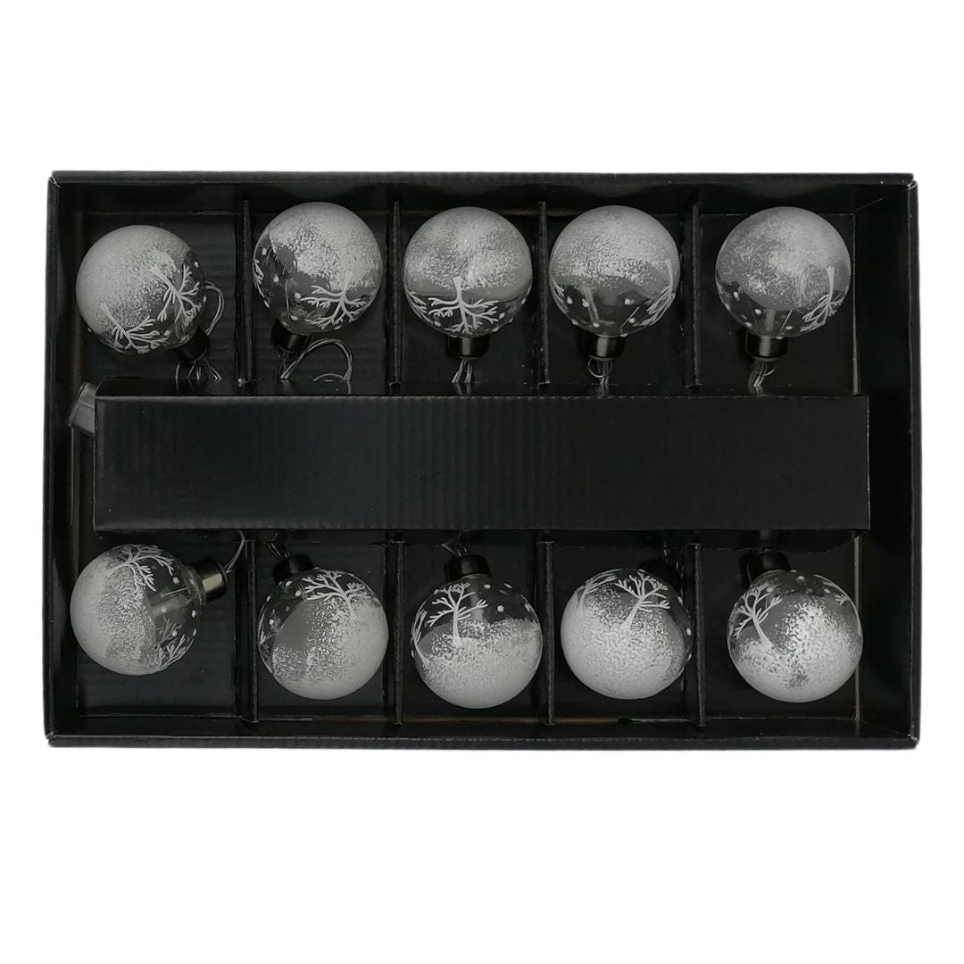 White cut out product image of the string of 10 bauble shaped winter scene battery operated lights in their box
