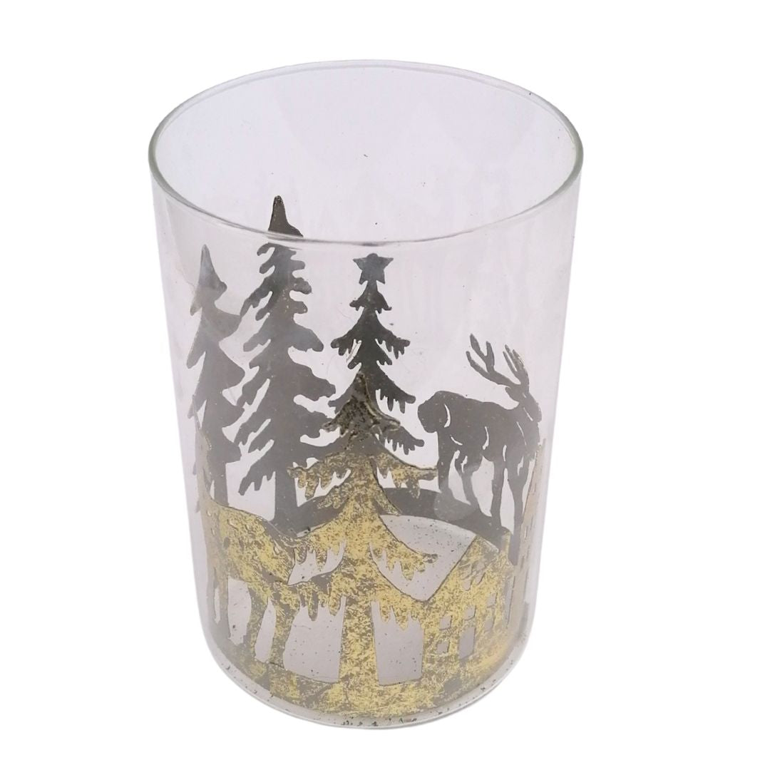 Clear glass with winter scene design featuring trees and deer on a white background