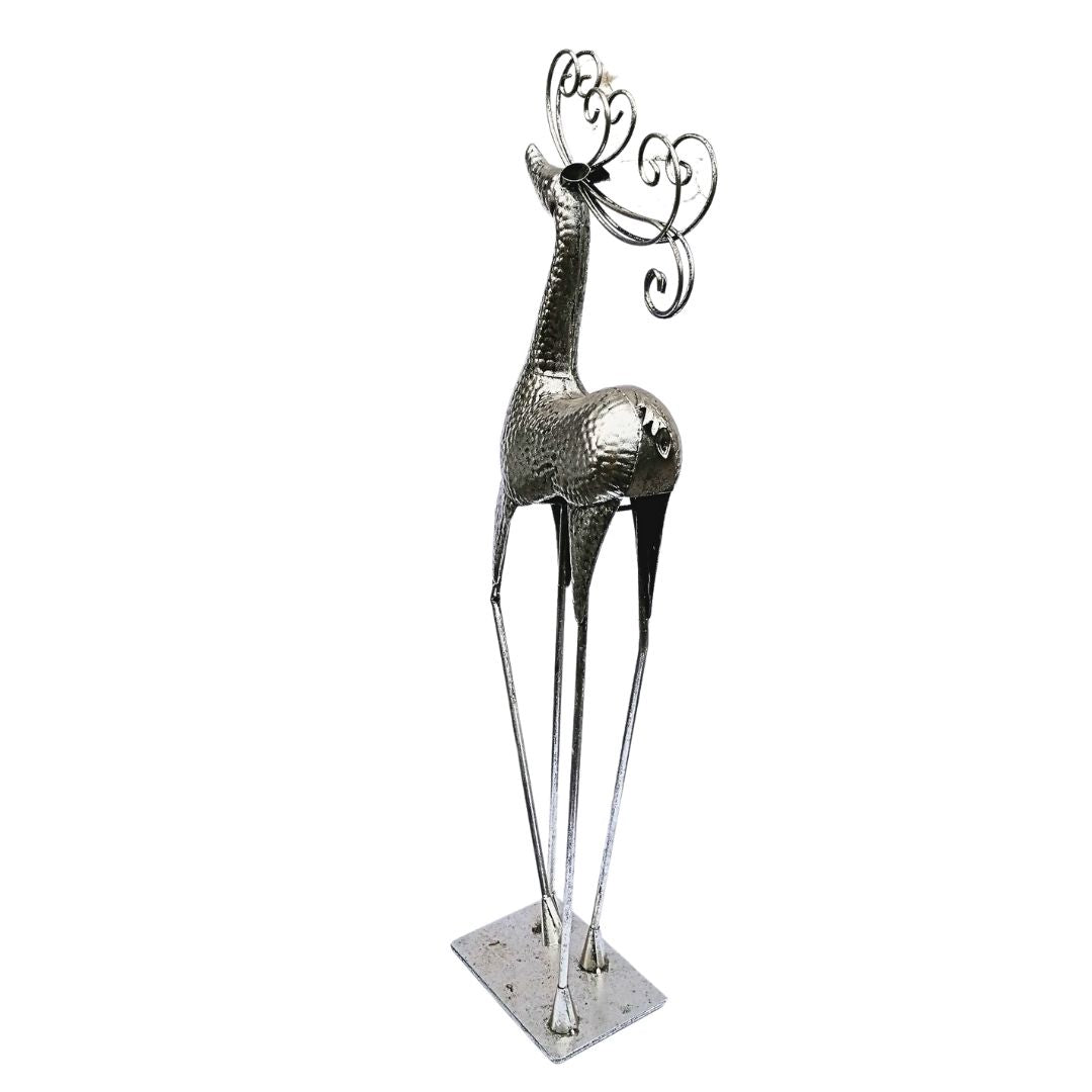 White cut out image showing the antique silver-effect hammered metal floor standing stag from behind and slightly to the side