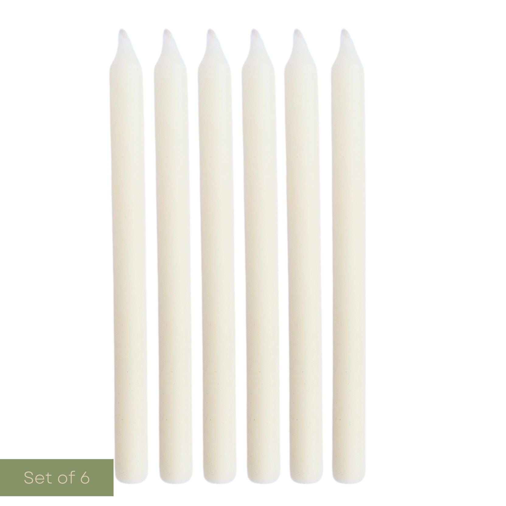 Set of six white candles on a white background