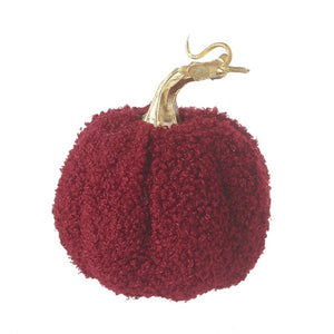 The burgundy fabric pumpkin with a gold stalk. and a close up fo teh unusual fabric