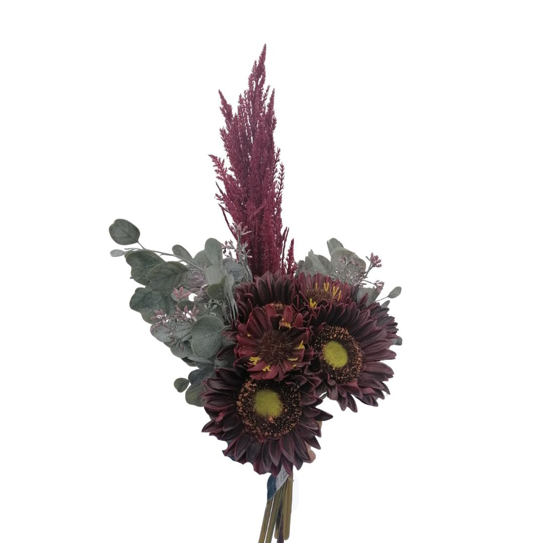Bouquet of artificial flowers with purple and green elements on a white background