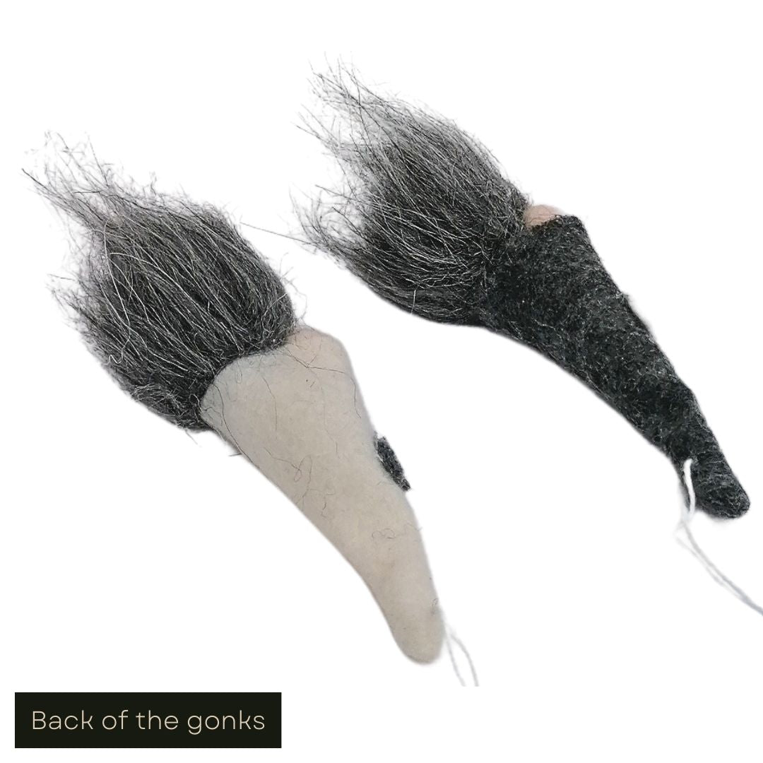 White cut out product image showing the backs of the charcoal grey and white fabric gonk hanging decorations