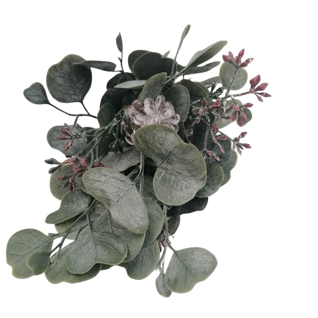 Artificial eucalyptus branch with green leaves and small pink berries on a white background