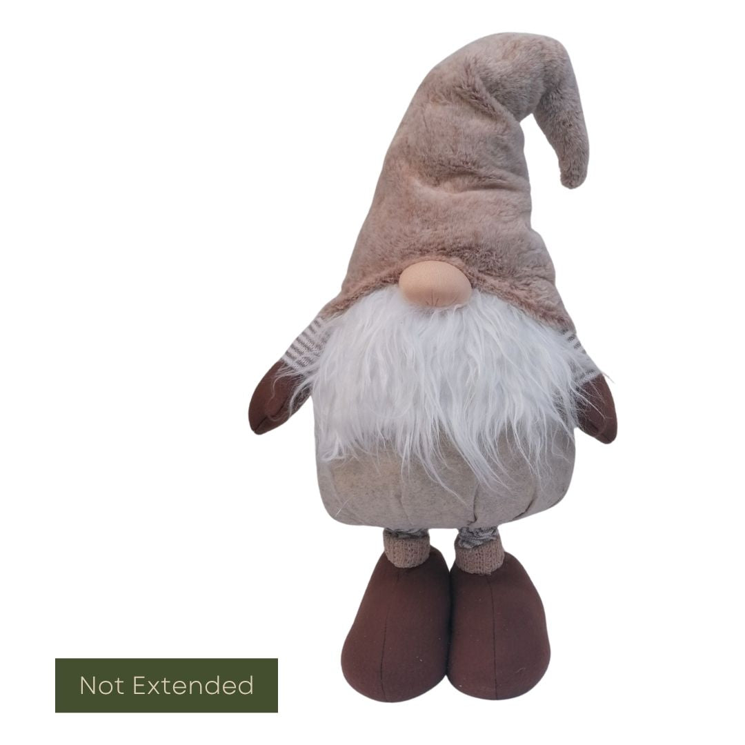 Plush gonk with a brown hat and white beard on a white background
