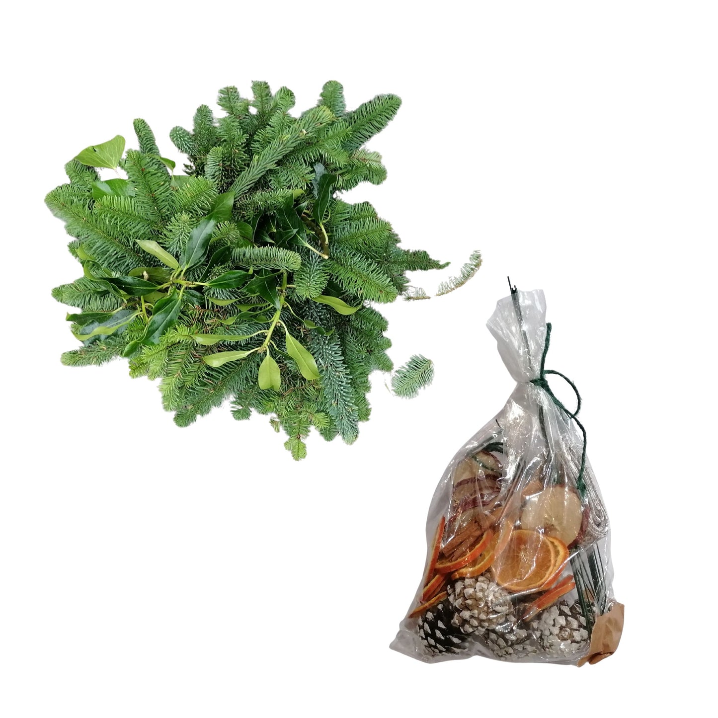 Bouquet of greenery and a bag of decorative items on a white background