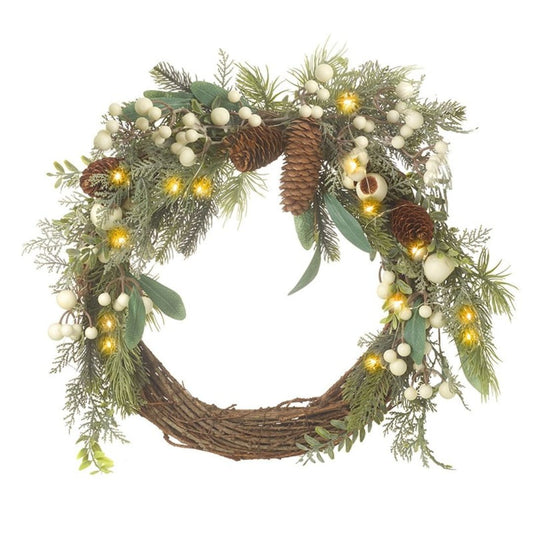 Decorative wreath with greenery, berries, pinecones, and lights on a white background