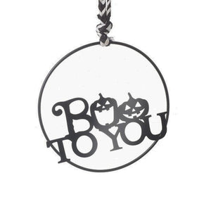 Boo To You Halloween Hanging sign with the text written across the middle, and the O\s replaced with carved face pumpkins.  Finished off with a black adn white bakers twine rope