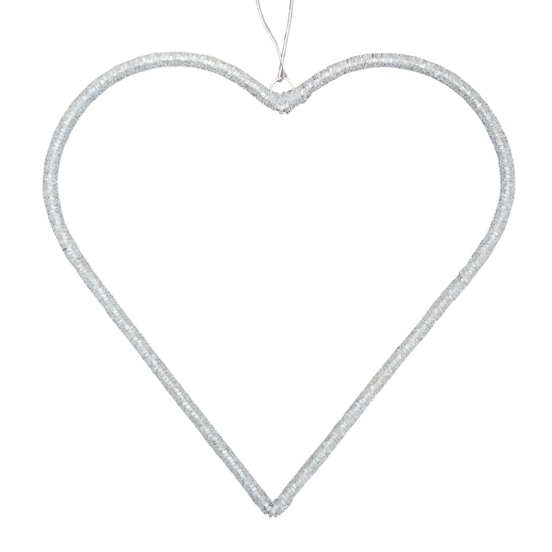 Clear beaded heart-shaped ornament on a white background
