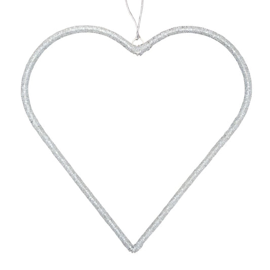 Clear beaded heart-shaped ornament on a white background