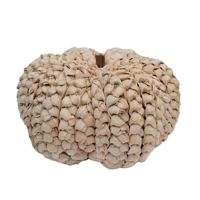 Beige woven pumpkin on a white background