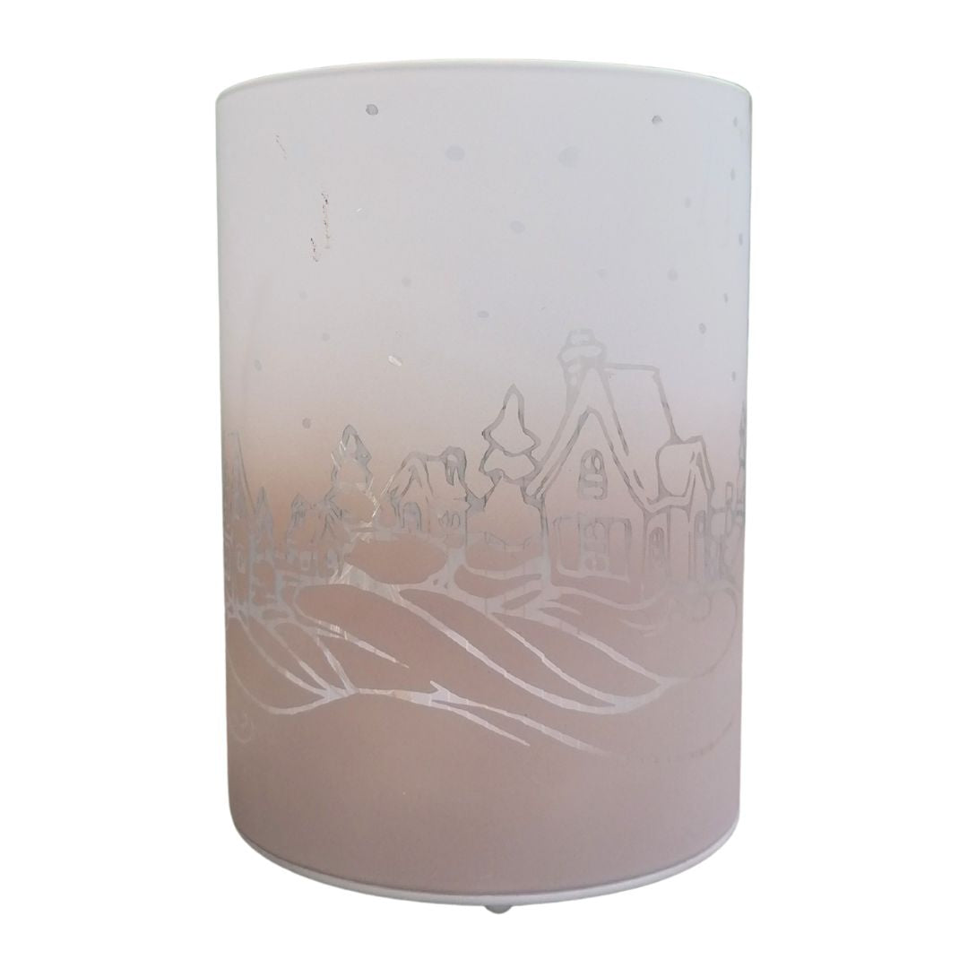 Frosted glass holder with winter scene design on a white background
