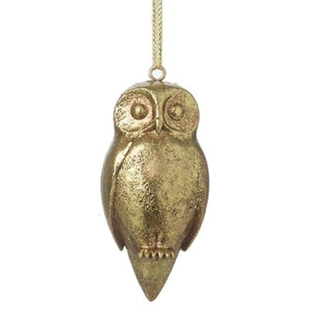 Gold owl hanging ornament on a white background