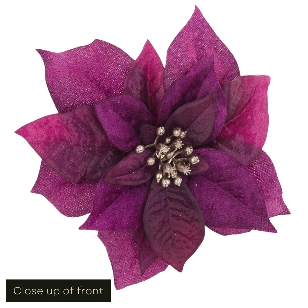 White cut out product image showing a close up of the front of the purple silk poinsettia decoration