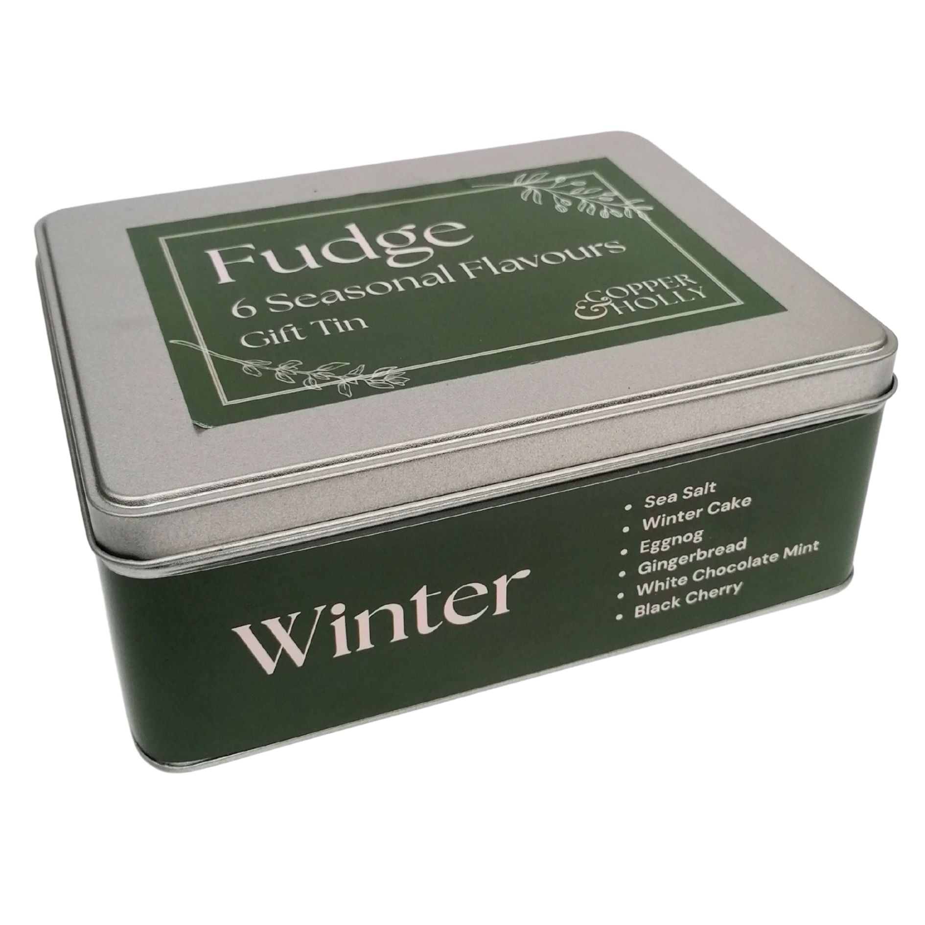 Seasonal fudge tin taken from teh side on a white background