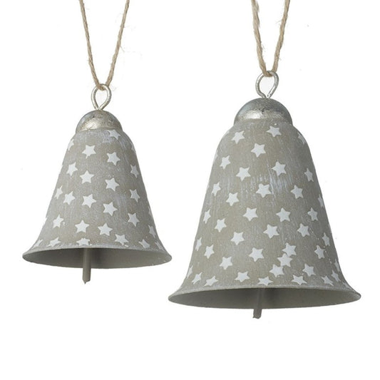Two gray bells with white star patterns hanging on strings against a white background