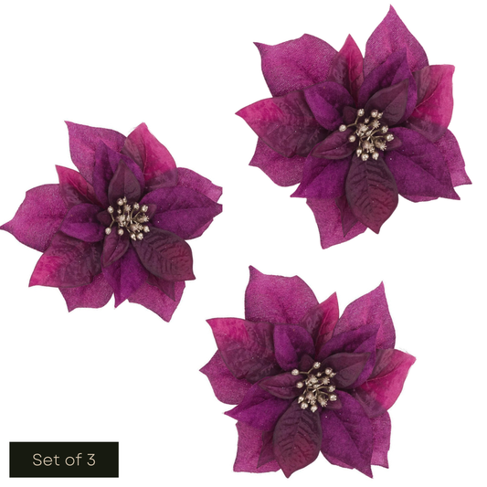 White cut out product image showing 3 purple silk poinsettia decorations