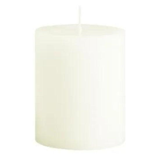 White cut out image of the short ivory fragrance-free pillar candle close up