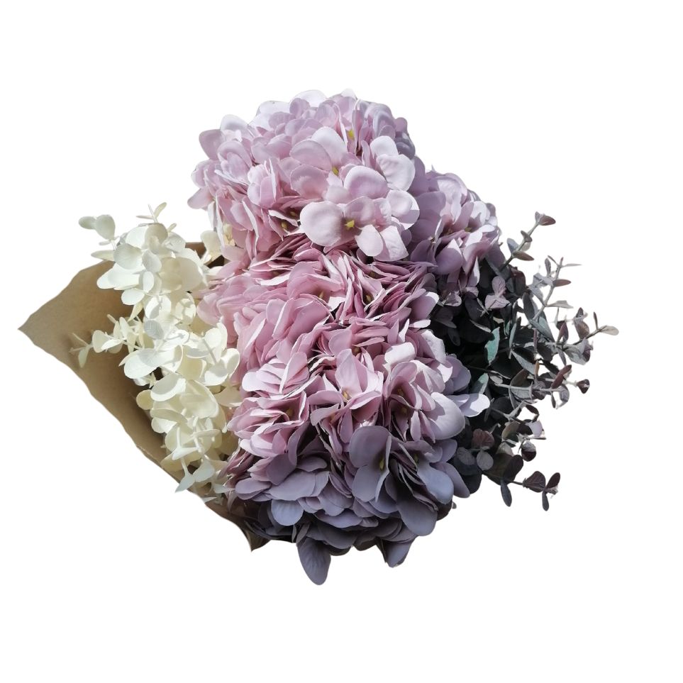 Bouquet of lilac and white flowers with greenery on a white background