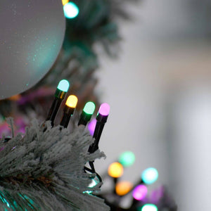 Showing a close up of the 4 bulb colours of pale blue, yellow, pale green and pink in the 1000 pastel tree lights