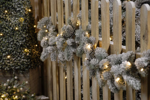 200 Warm White LED String Lights on a fence garland