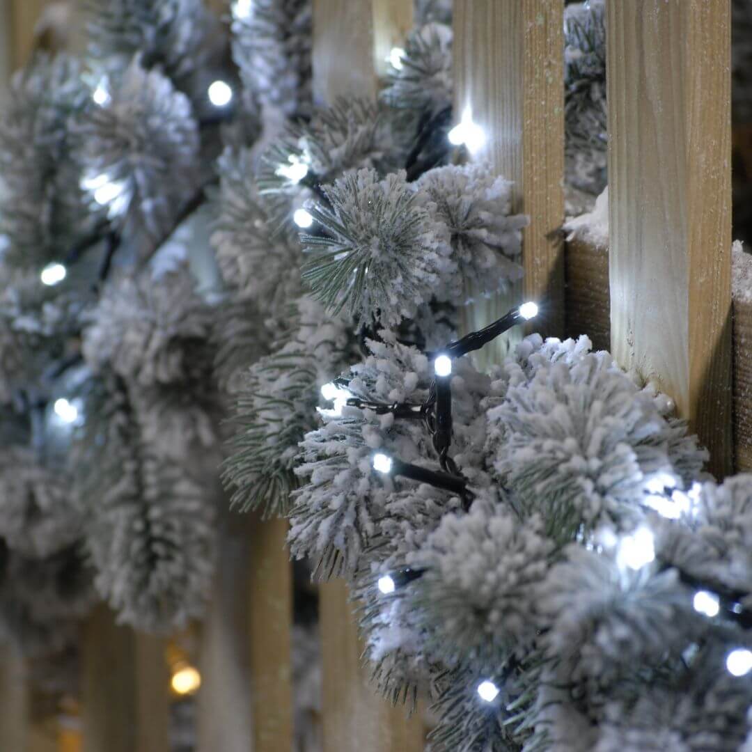 Close up of 300 cold white firefly Christmas lights on a garland