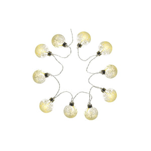 Battery powered Christmas string lights made up of 1`0 winter scene glass baubles