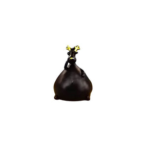 Black reindeer ornament with gold antlers and nose, sitting with a very full body from eating too many carrots!