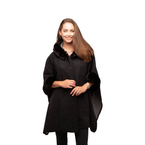 Black faux fur cape with hood as worn on a model