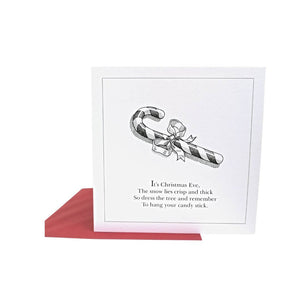 Black and white Christmas card with cheery red envelope with candy cane on the front