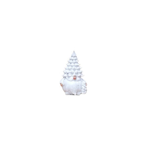 All white Christmas tree gonk with a fir tree on his head clutching a fir tree in his left hand