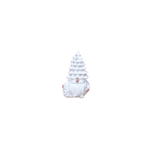 All white Christmas tree gonk clutching a fir tree i his right hand