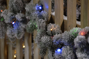 360 Multi Colour LED String Lights and a close up of the garden fence Christmas garland bulbs