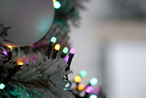 Close up of the 760 pastel tree lights showing the 4 different coloured bulbs of green, orange, blue and pink