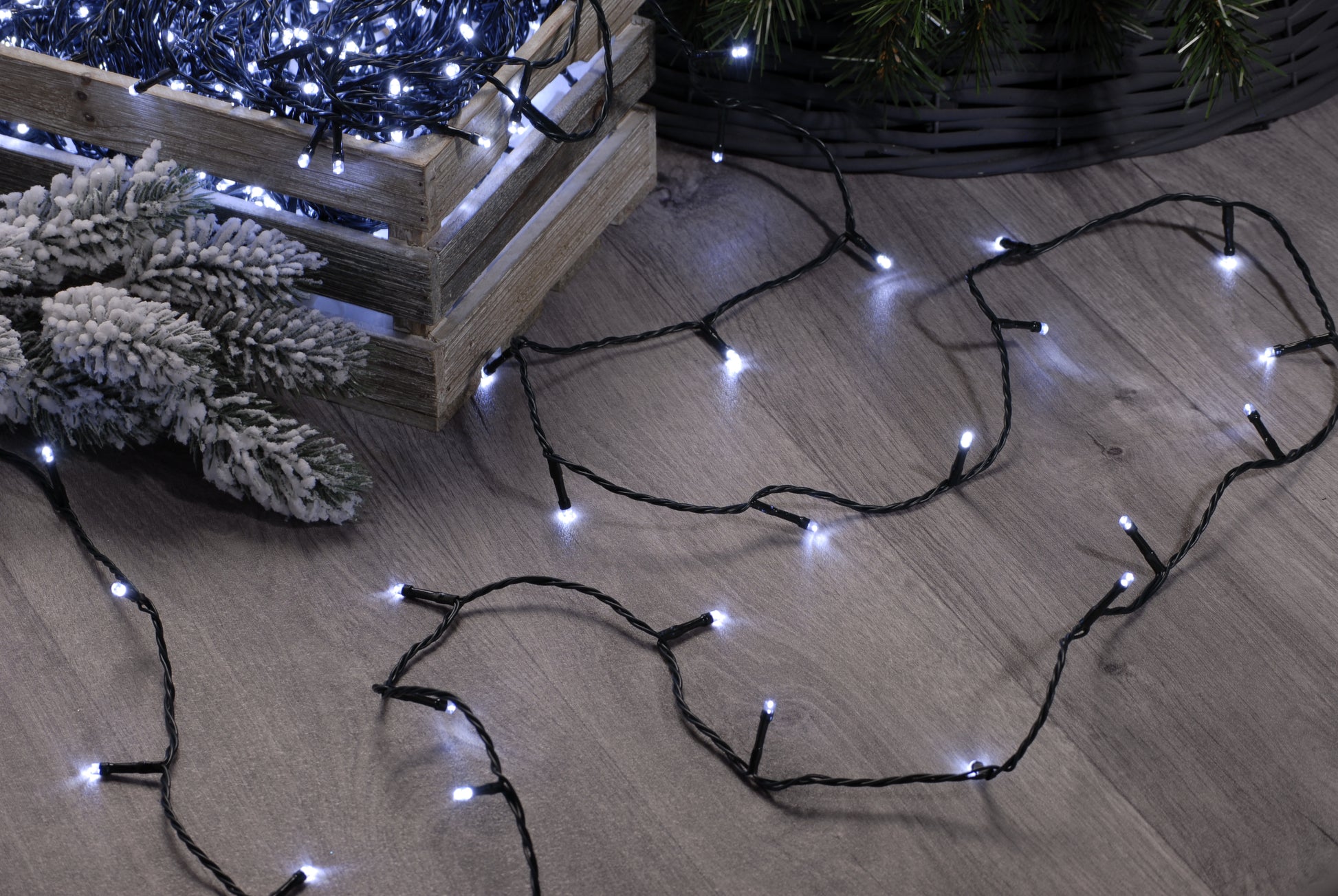 200 cold white LED string Christmas lights coming out of box on the floor