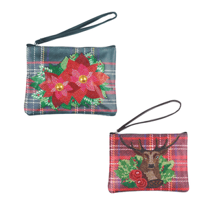 The two designs available in the crystal art kits purses, featuring poinsettias and stags