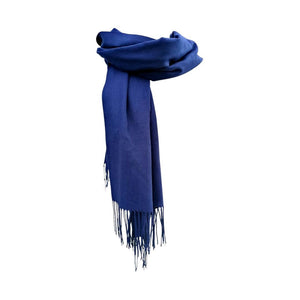 Deep blue long pashmina scarf shawl with fringe draped over shoulder