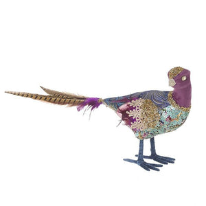 Luxurious feathered bird ornaments in purples and blues with gold