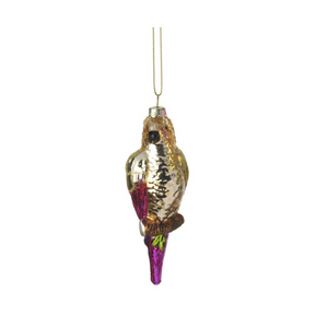 The antique gold bird tree decoration with hot pink and antique gold wings