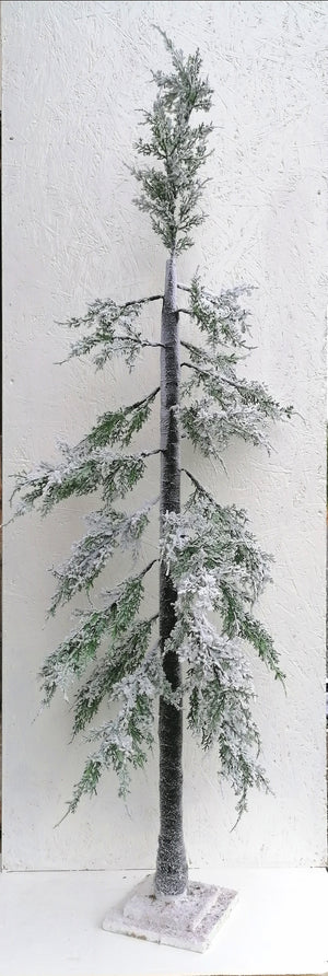 Heavily flocked fir tree that stands approximately 150cm tall