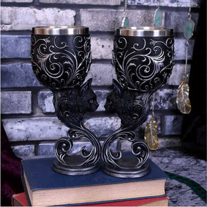 Showing the halloween metal goblets in a display.  Theres two of them here, facing the same way, but actually it is just the one turned around!