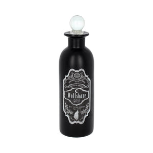 All black ceramic halloween potion bottle showing the aged effect label and clear stopper that is attached